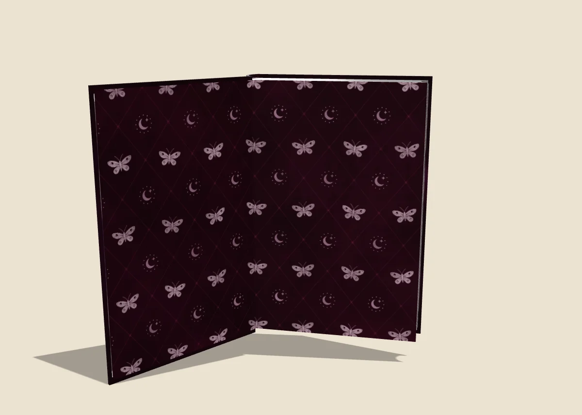 Crown of Moth & Ash open on its moth-and-moon endpapers